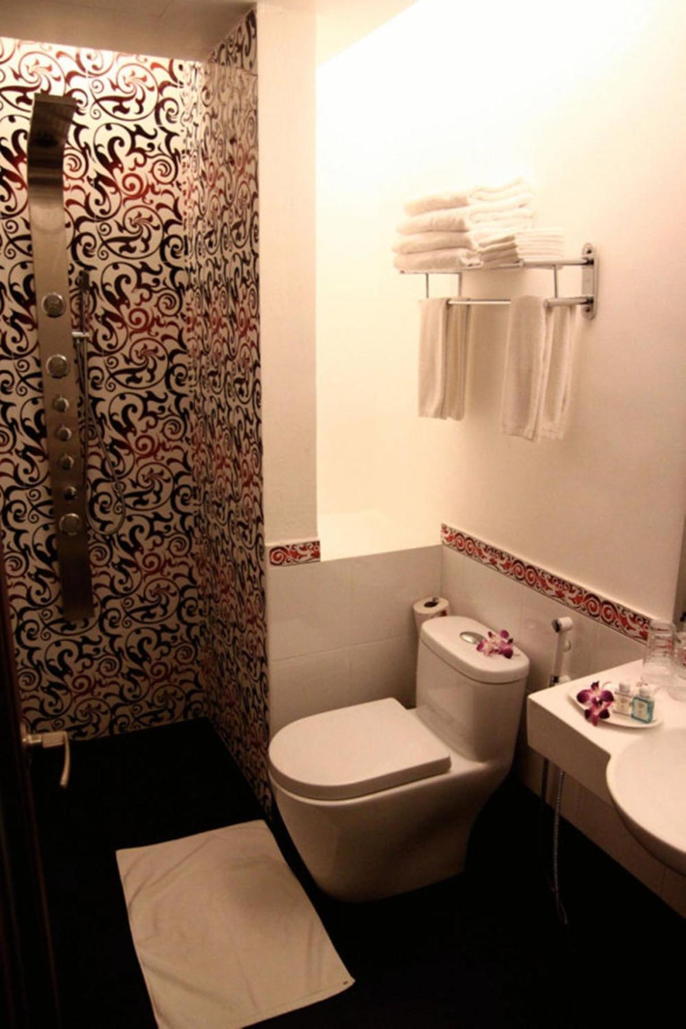 Arenaa Deluxe Hotel Malacca Phòng bức ảnh